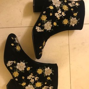 Embroidered black boots